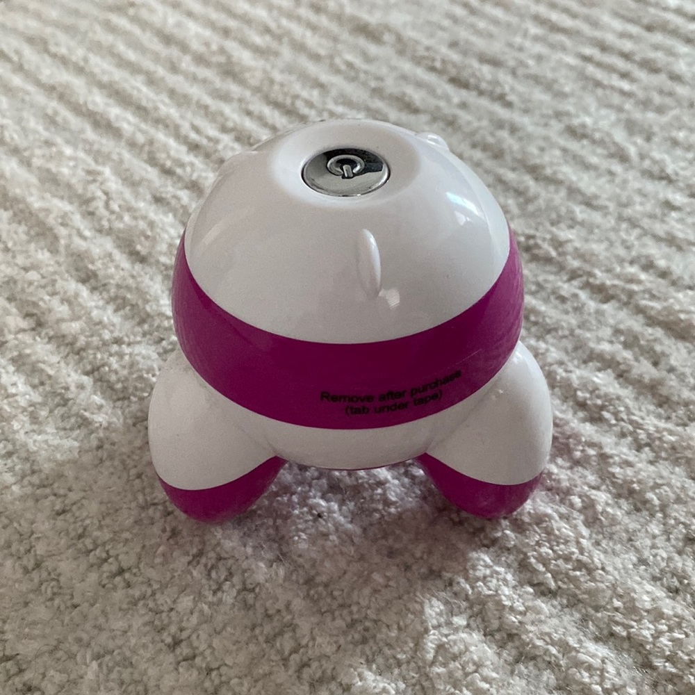 Handheld massager vibrating